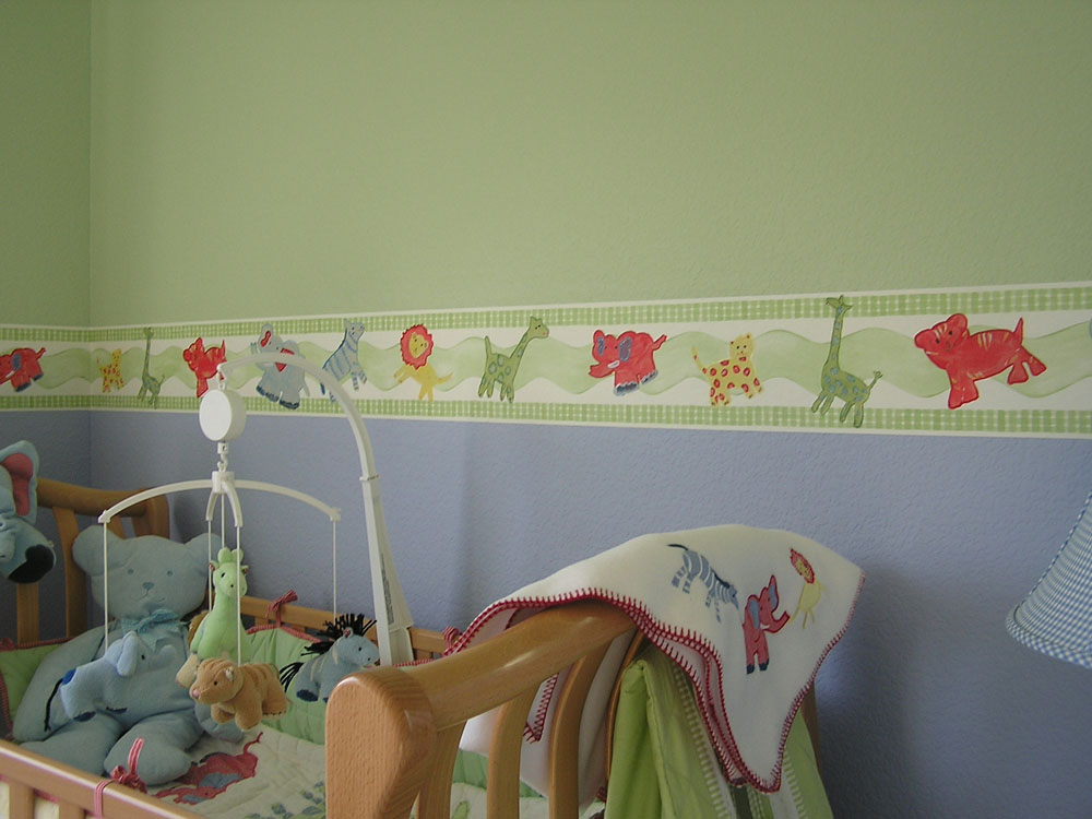 After: Hand Painted Nursery Mural borders with animals to match Pottery barn decor - Painted on top 