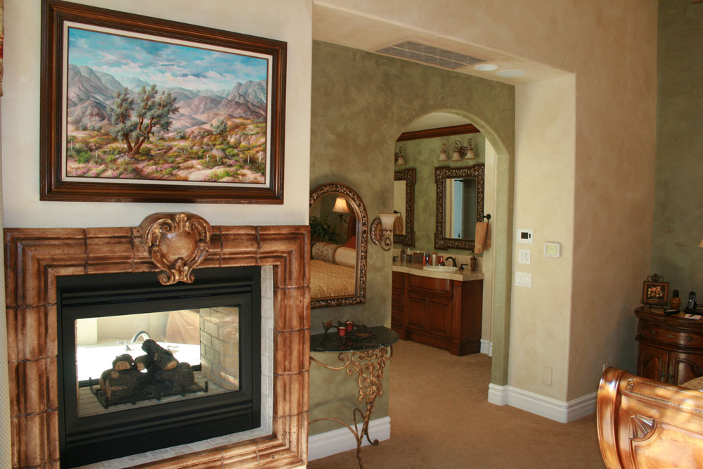 Faux Finished two tone glazing with Luster stone venetian plaster with Fireplace Gold Leafed aged Fa