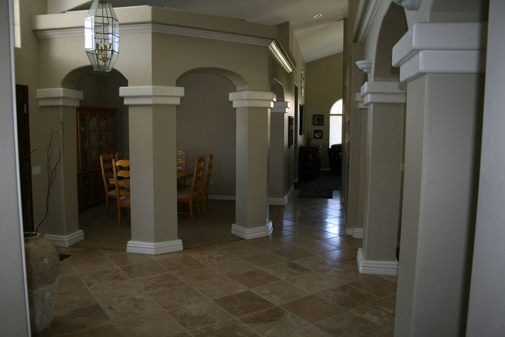 Before: Drywall square columns to be Dark Brown Marble