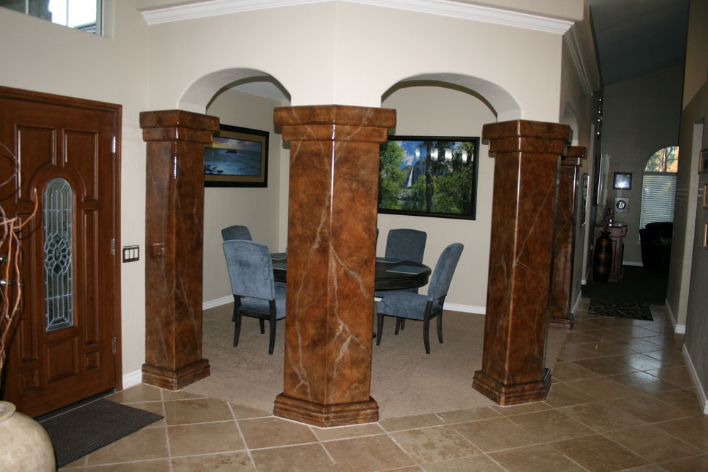 After: Drywall square columns to be Dark Brown Marble
