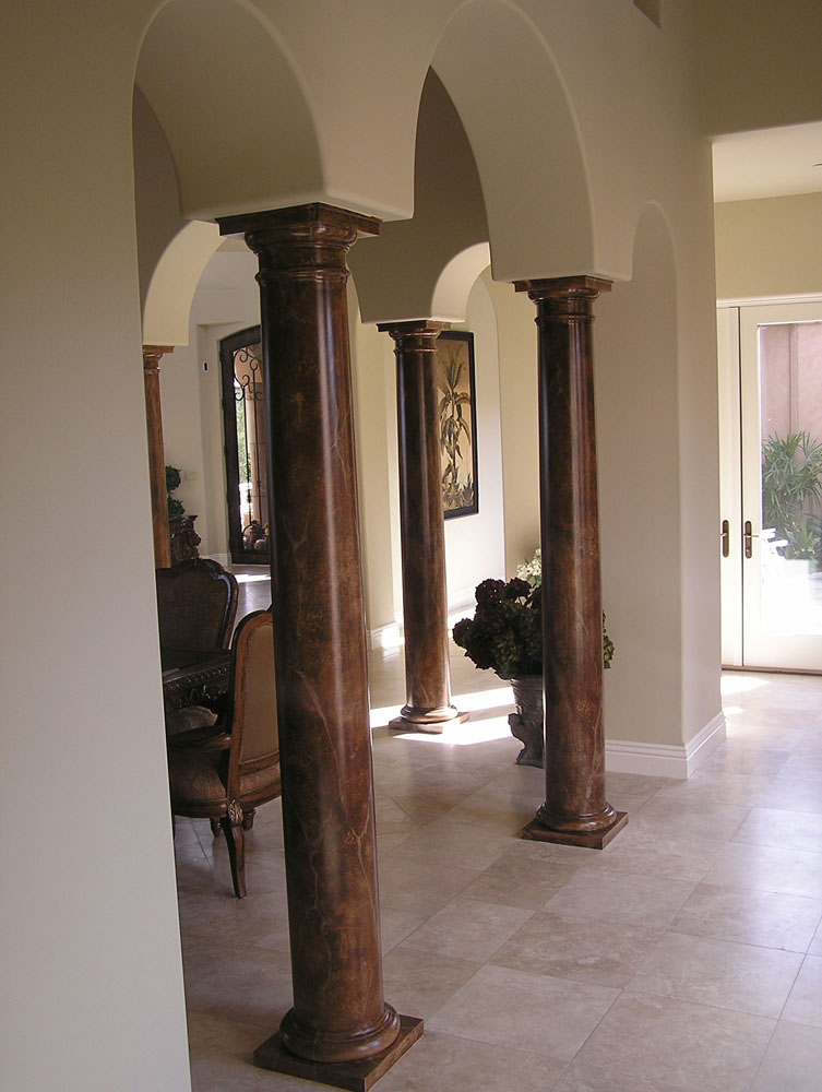 Before: Whiet painted Colums to be Faux Marble Columns