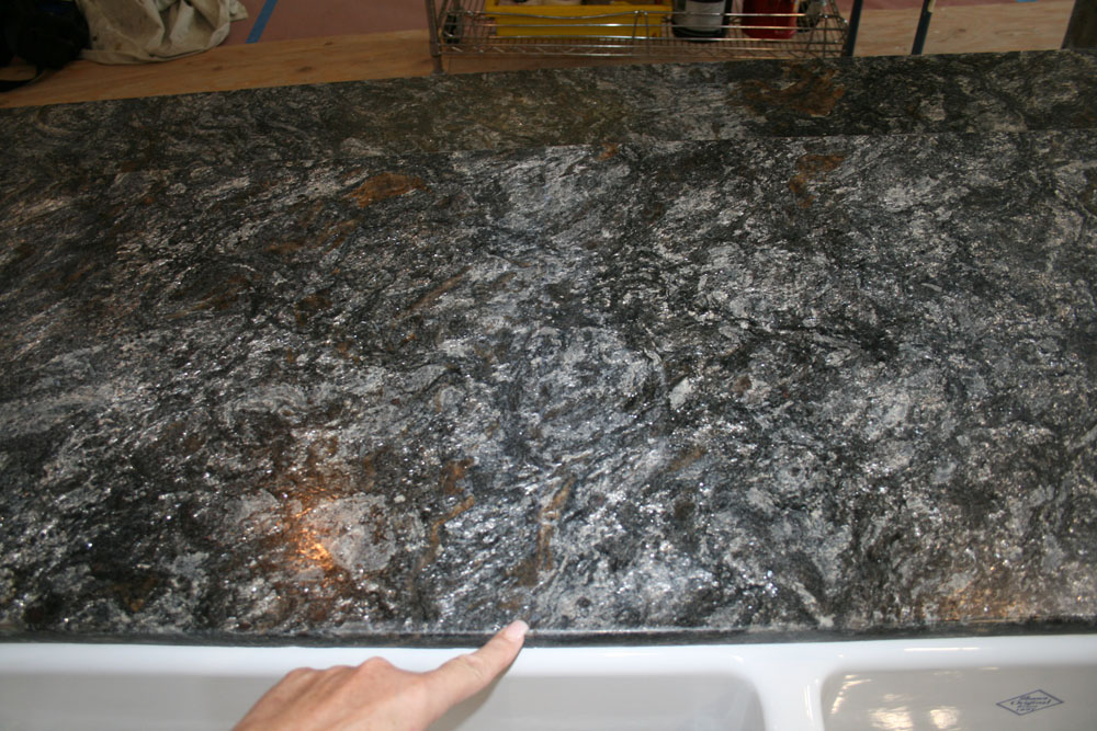 After: Granite - Two slabs not butted together enough- had a grout line to be disguised - Matched Gr