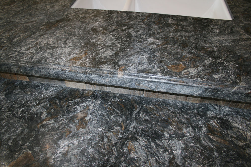 After: Granite - Two slabs not butted together enough- had a grout line to be disguised - Matched Gr