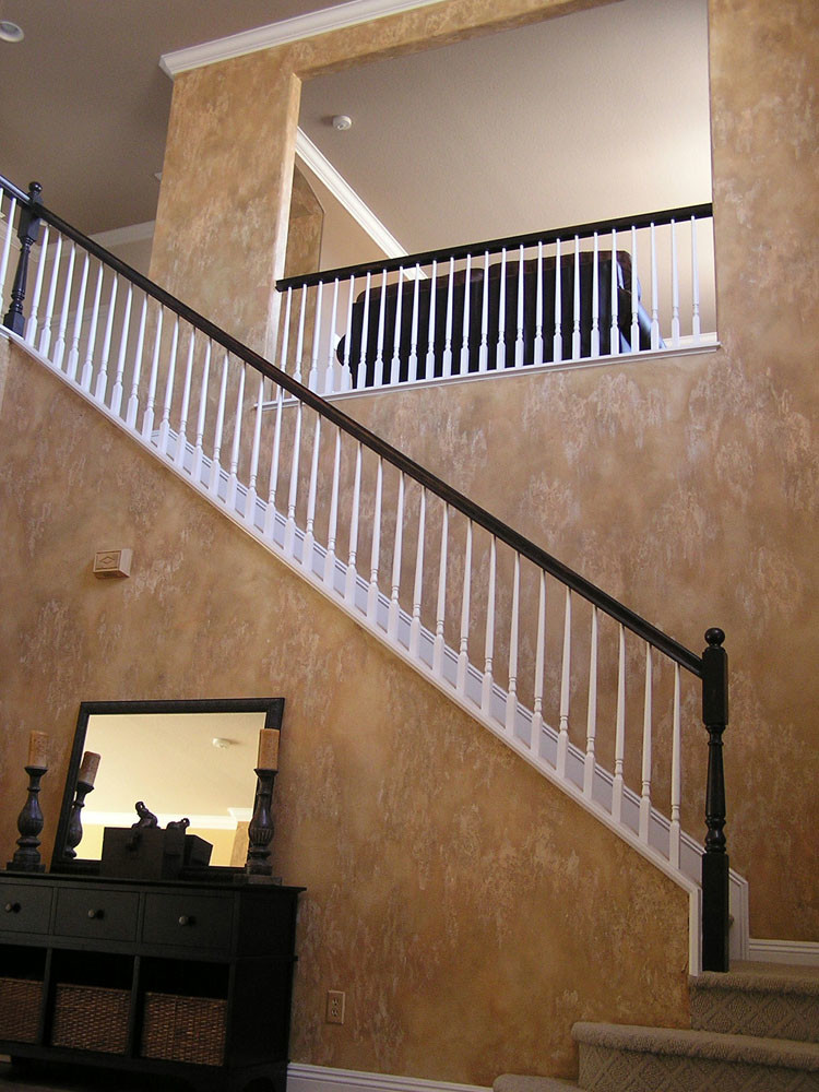 Distressed Old World Staircase with Faux Finished Walls